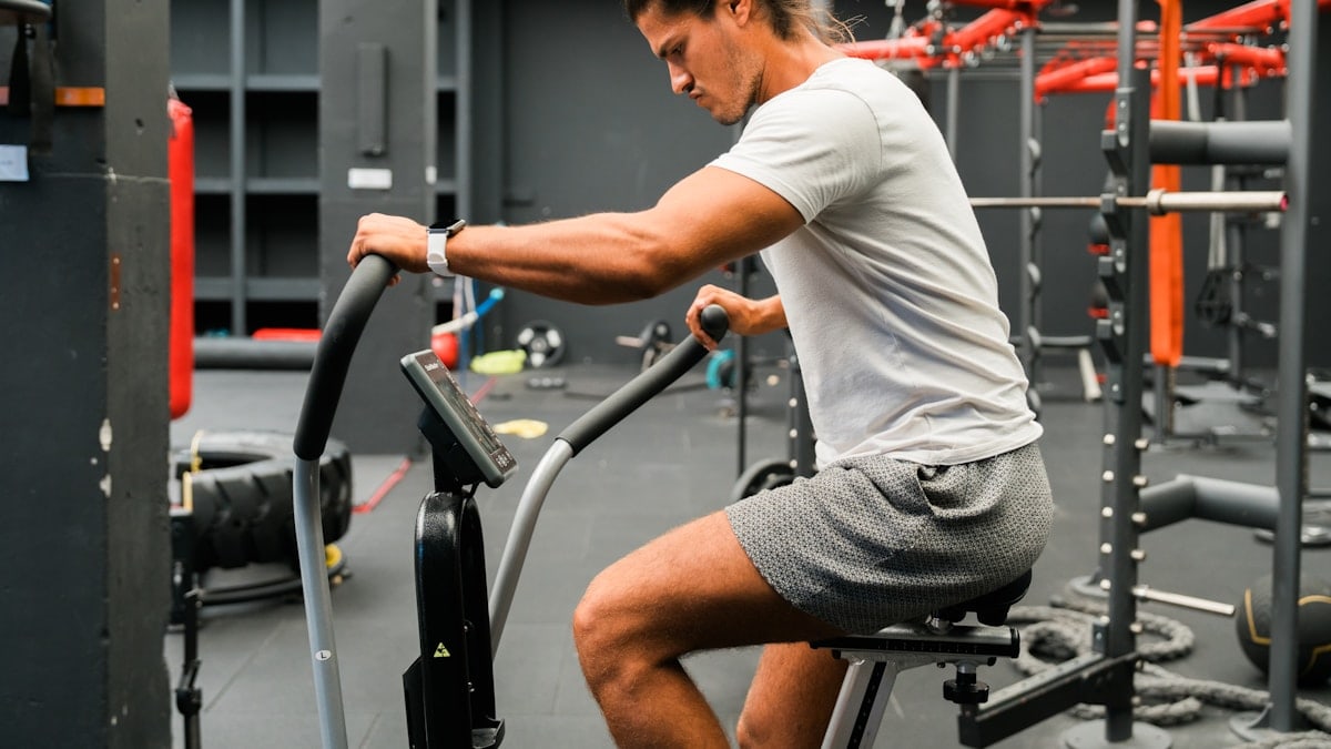 A woman working out on an exercise bike
